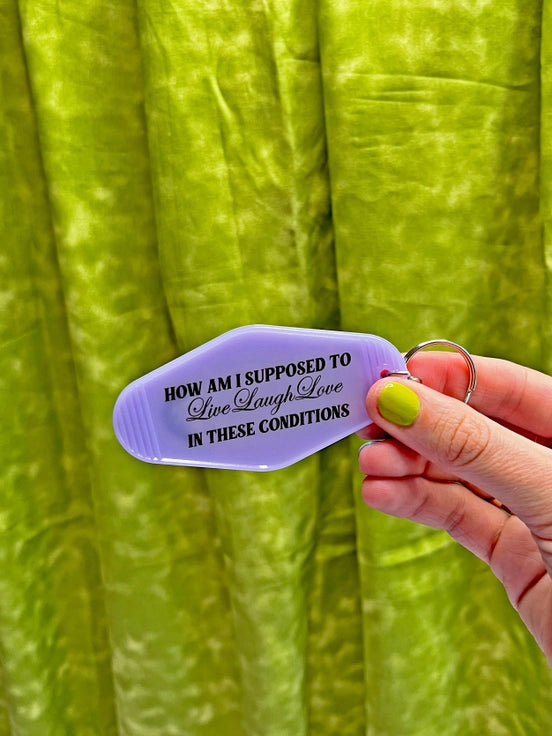 These Conditions Keychain by A Shop of Things