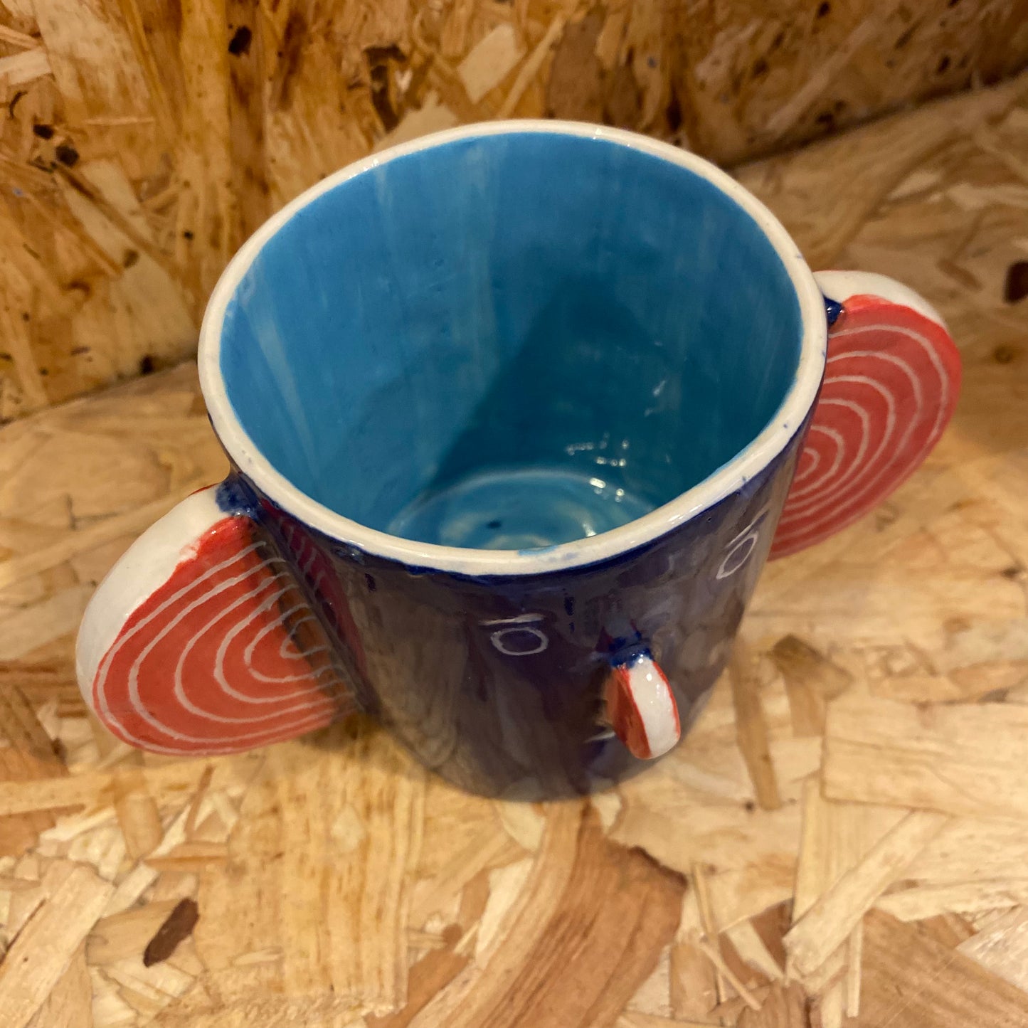 Blue & light blue Head Mug by John Molesworth