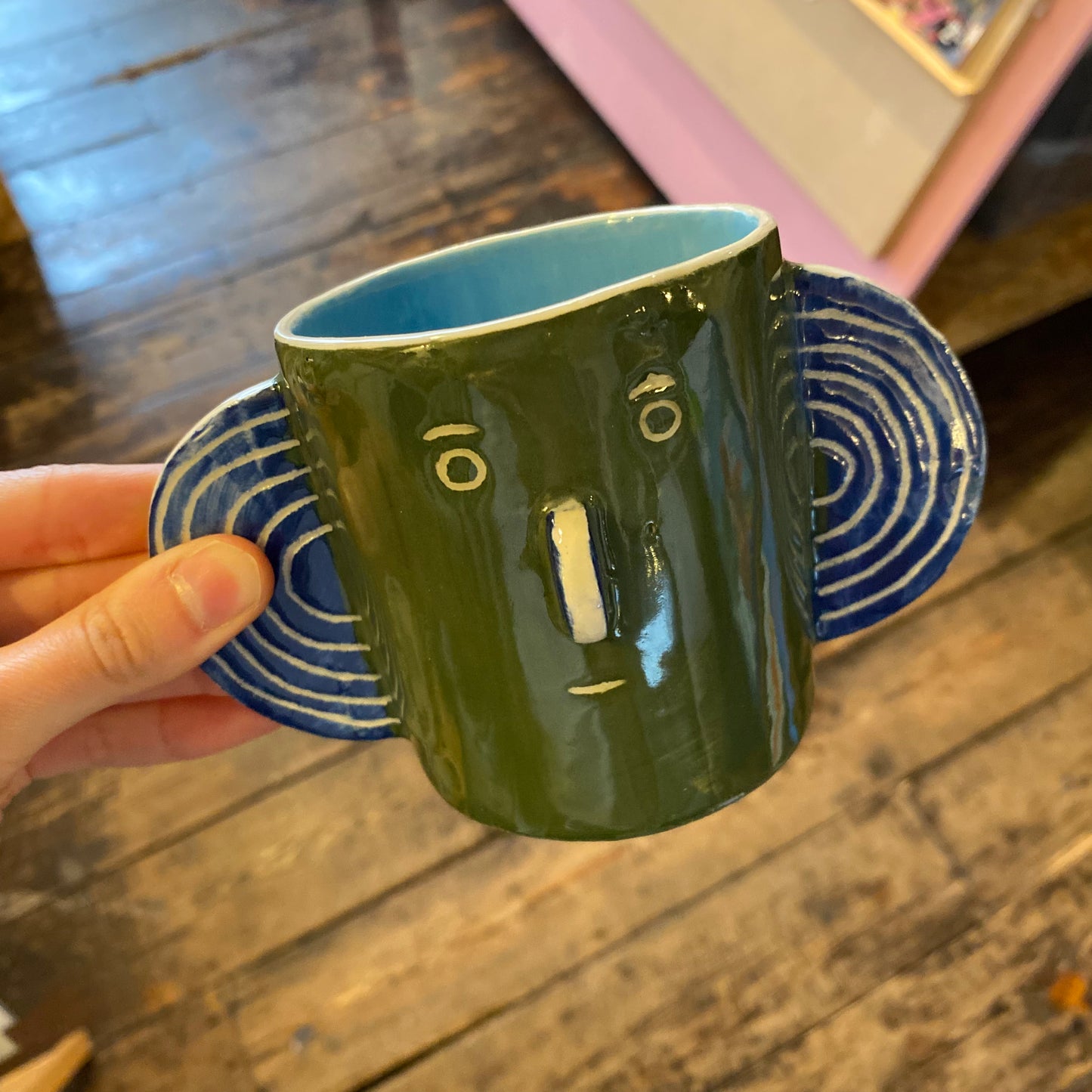 Green & light blue Head Mug by John Molesworth