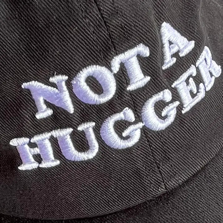 Not A Hugger Baseball Dad Cap by The Silver Spider