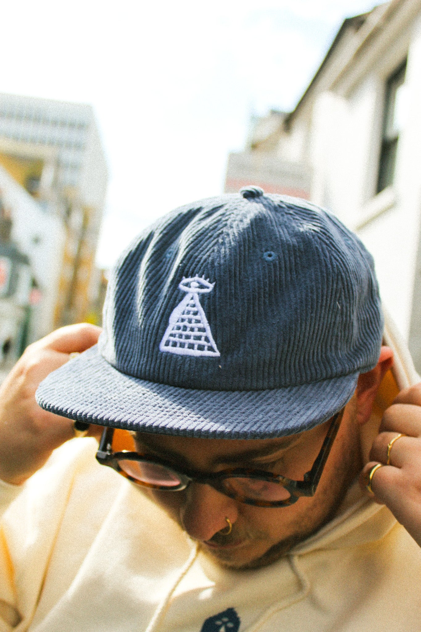 Sky Pyramid Embroidered Navy Cap by Stewart Easton