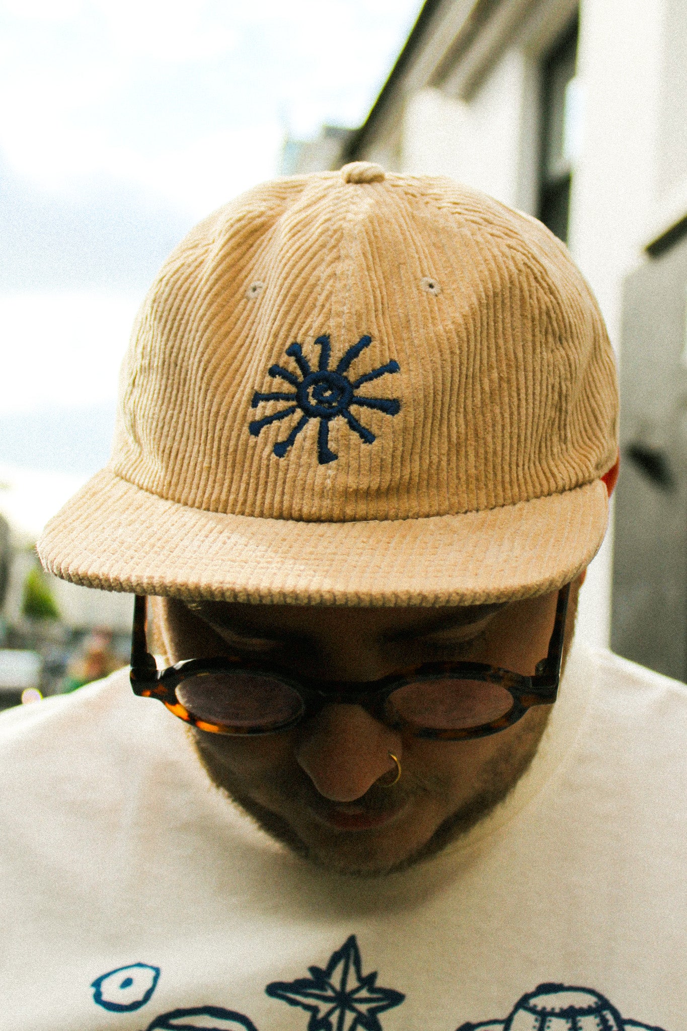 Earth Spiral Embroidered Khaki Cap by Stewart Easton