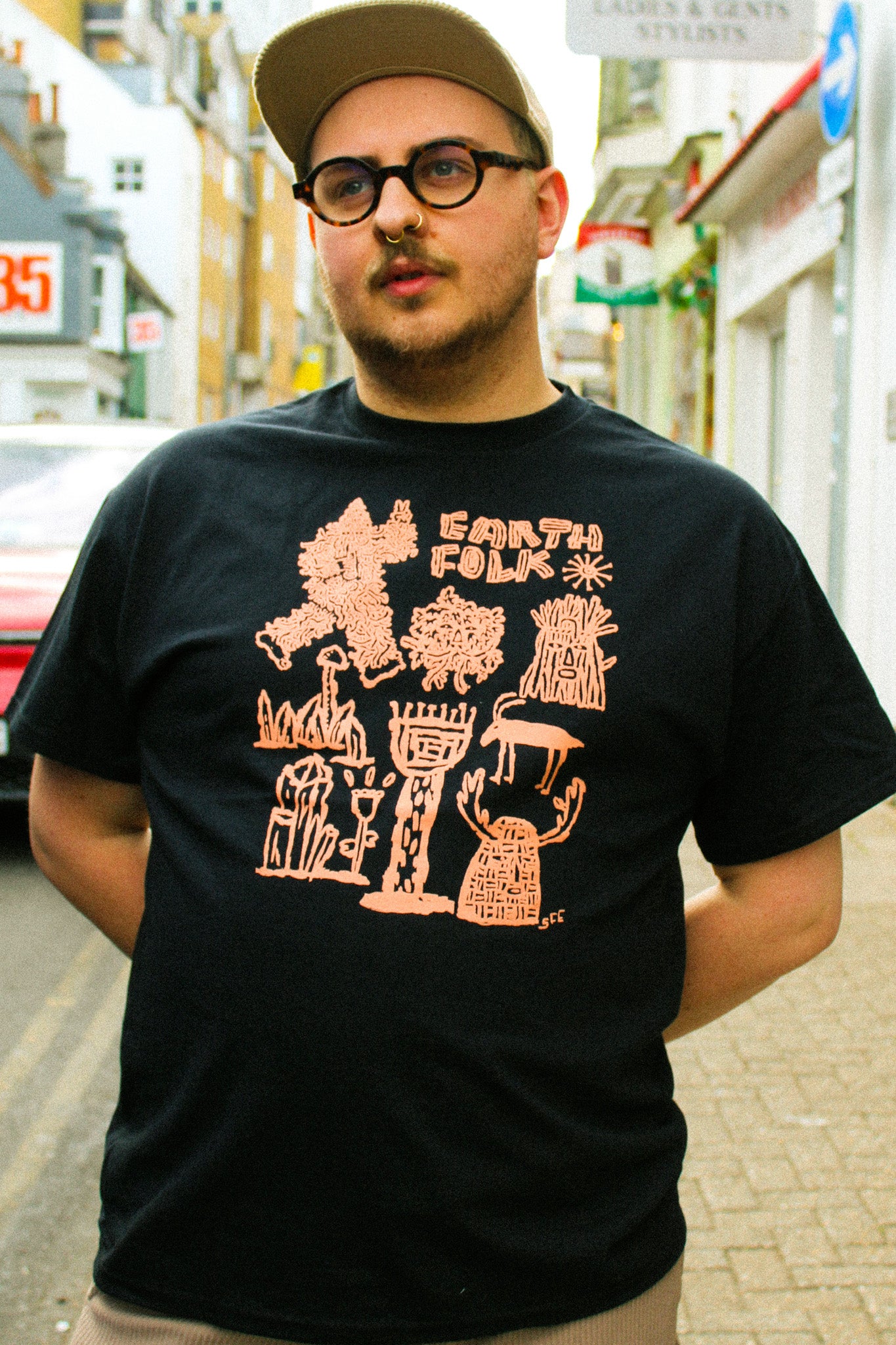 Earth Folk Black T-Shirt by Stewart Easton