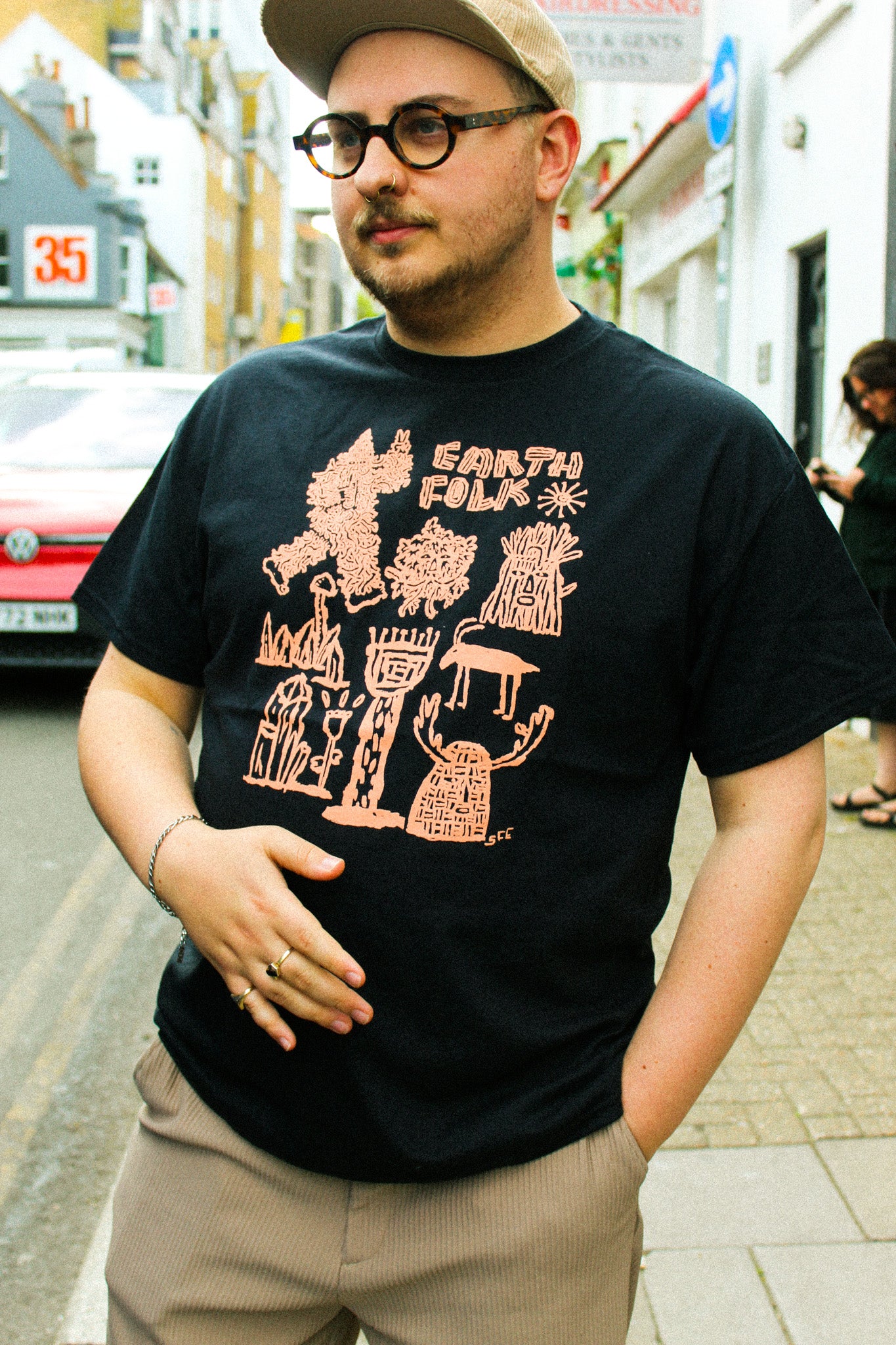 Earth Folk Black T-Shirt by Stewart Easton