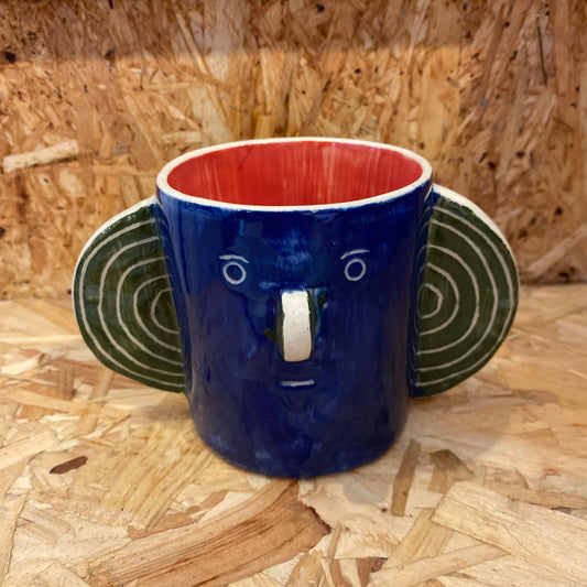 Blue & Red Head Mug by John Molesworth