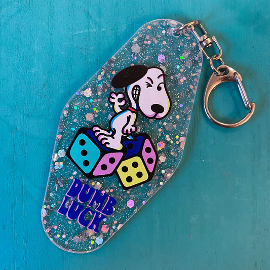 Sboopy ‘Dumb Luck’ Motel Key Tag by FURIOUS CREATIONZ