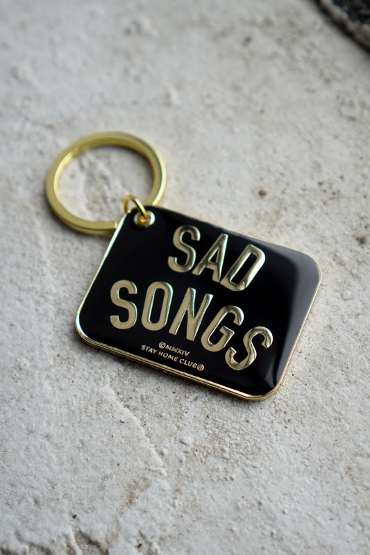 Sad Songs Keychain by Stay Home Club